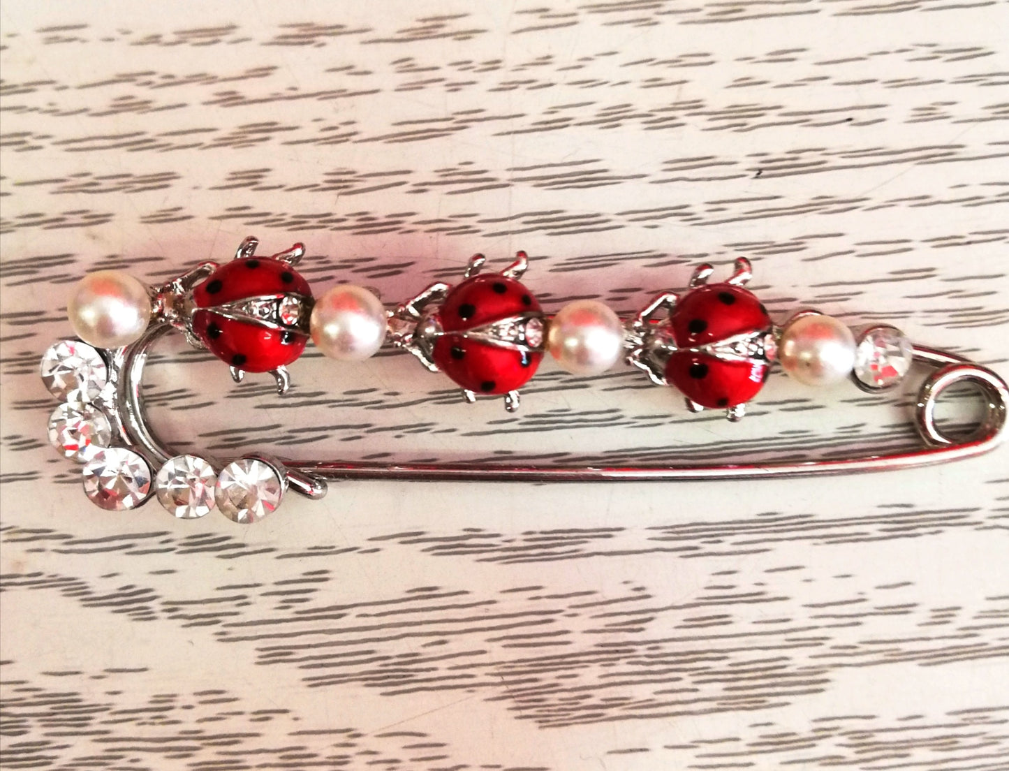 SPILLA COCCINELLE